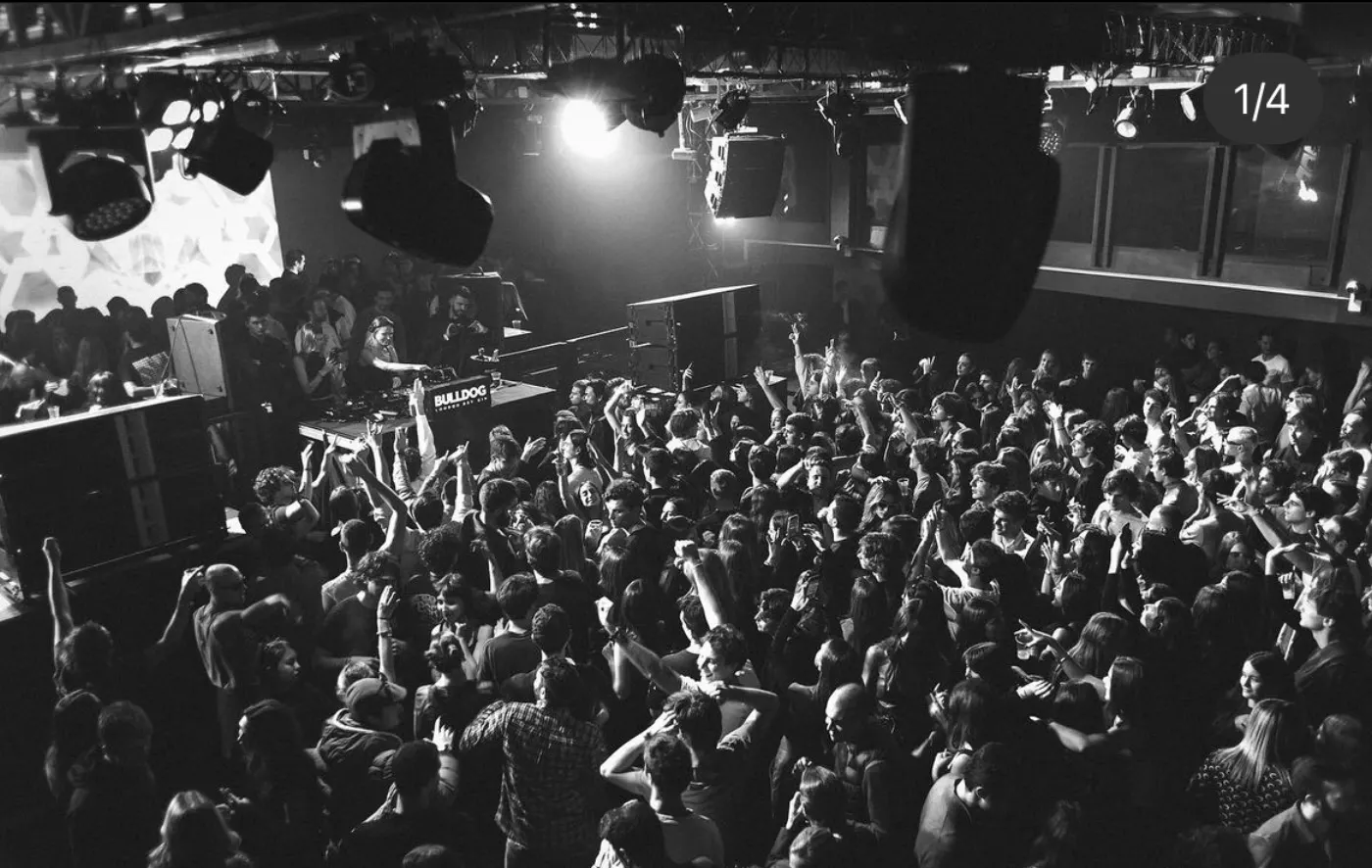 Wide shot of a packed dancefloor at an Atarashi night